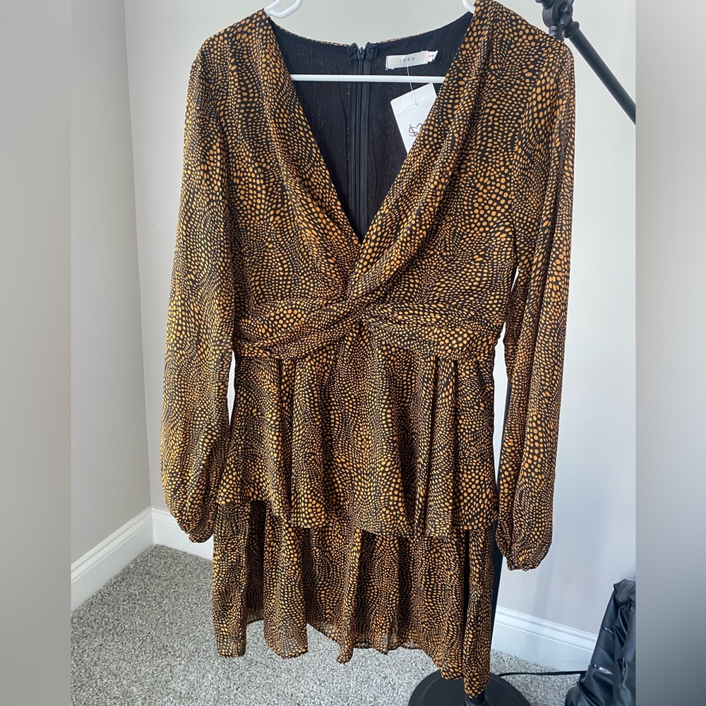 Black & orange dotted long sleeve trendy dress. Purchased from a local boutique